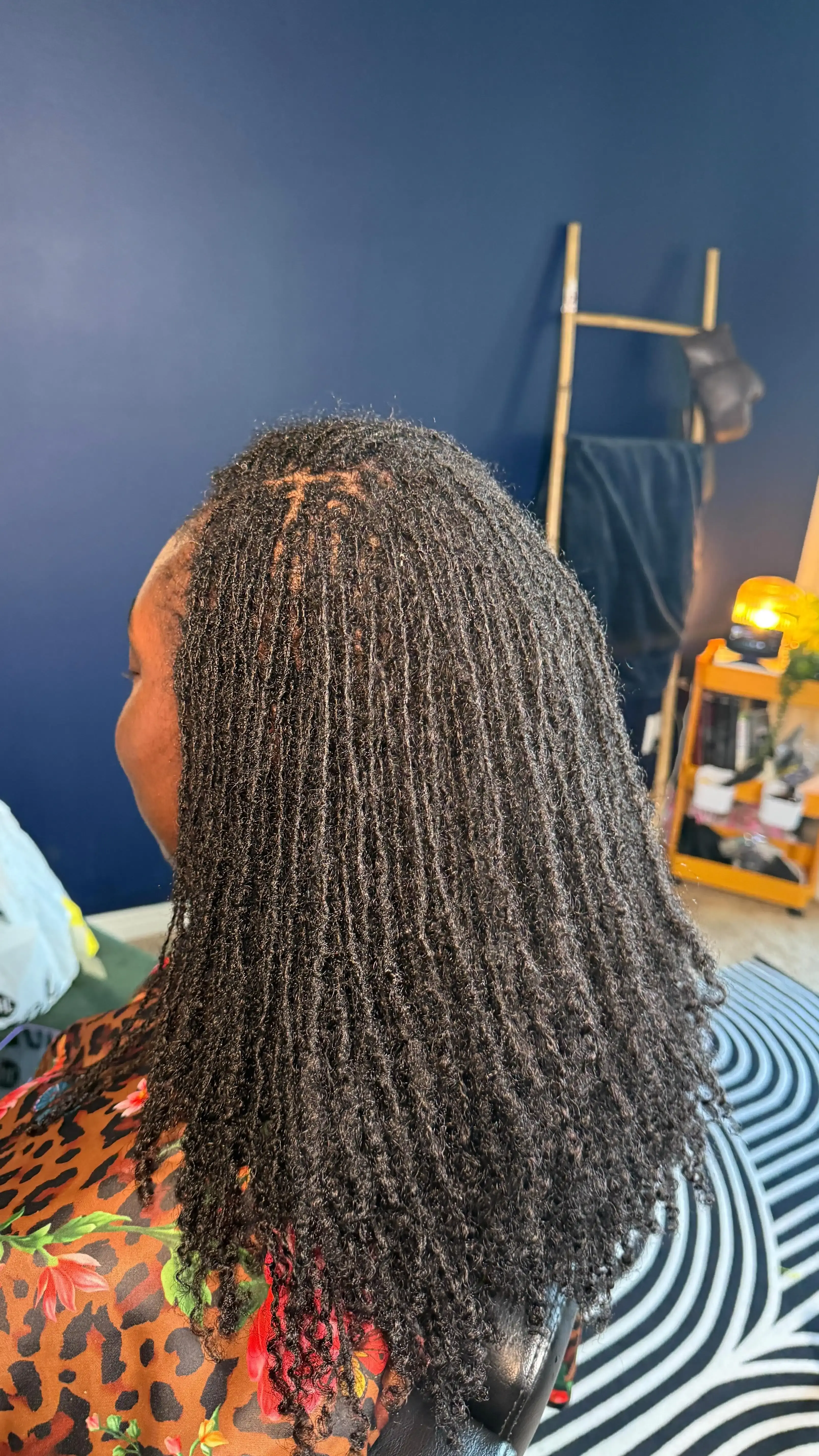 Neat and uniform loc pattern showcasing expert installation and retightening