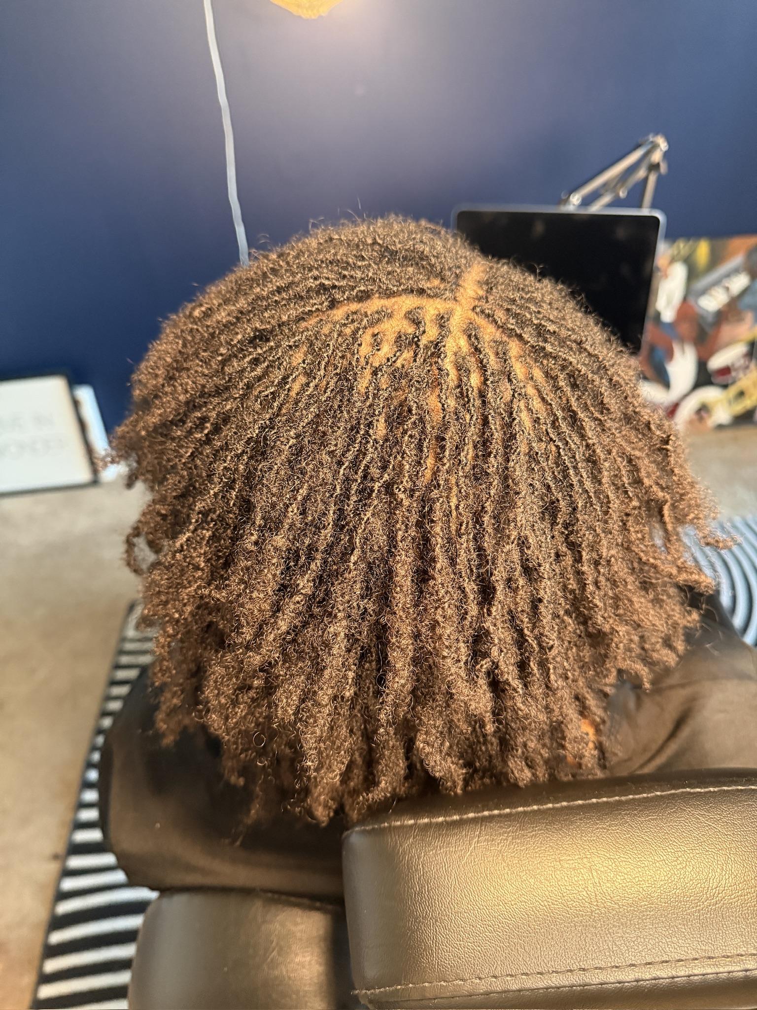 Tia — Sisterlocks™ after 1+ year of beautiful maturation